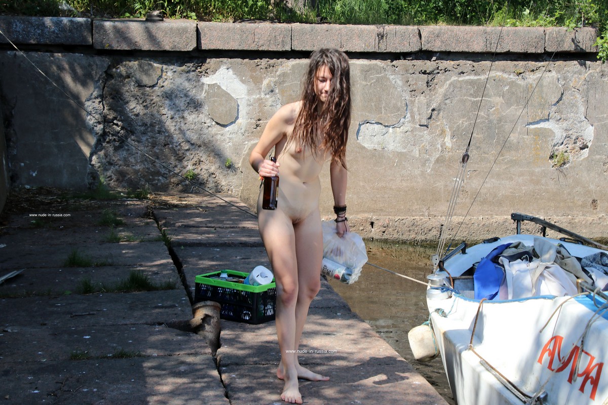 Two young girls take off their panties in an old fort