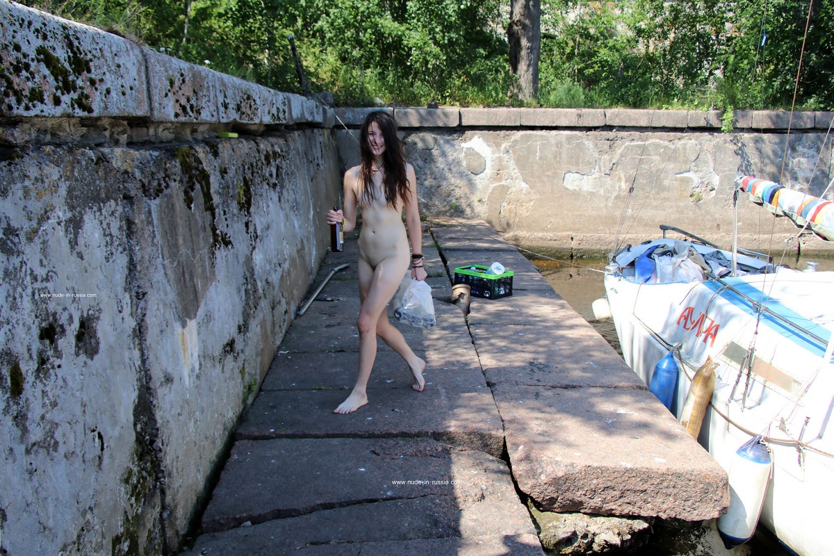 Two young girls take off their panties in an old fort