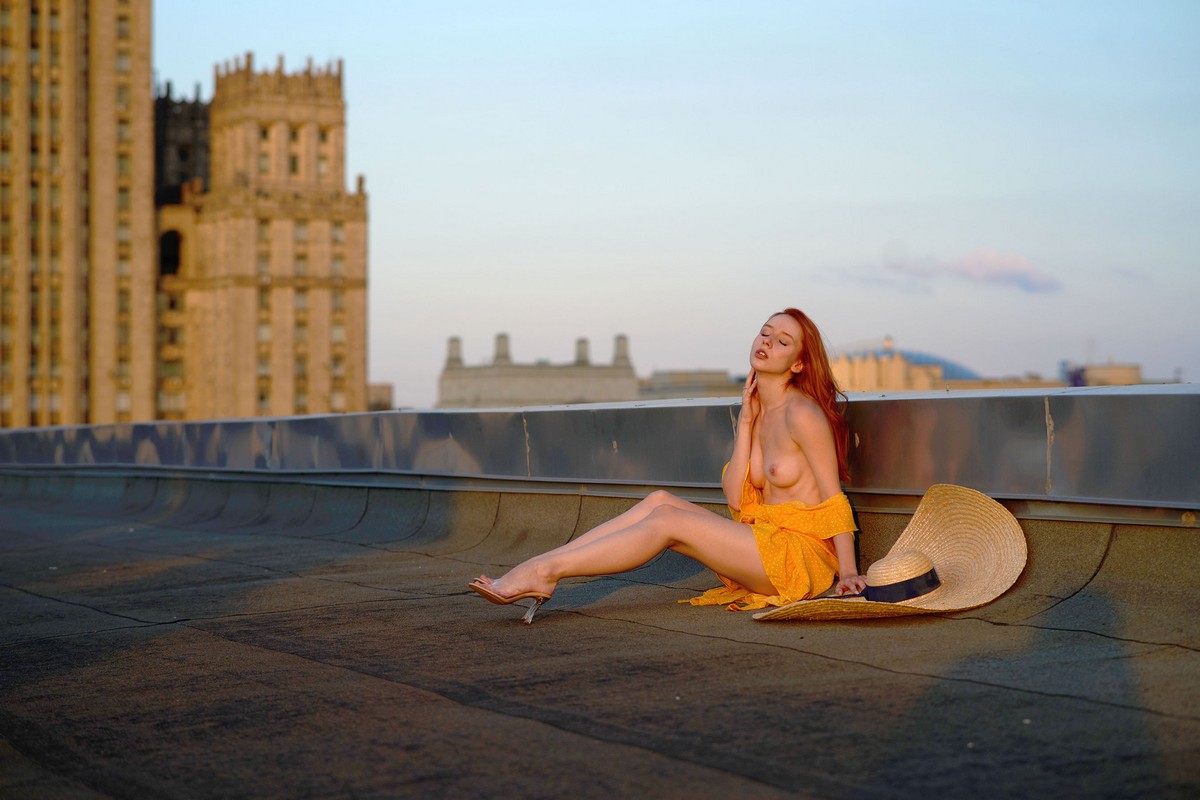 Perfect redhead teen Liz on the roof