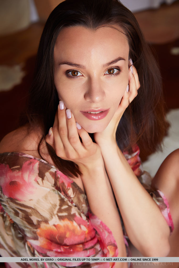 Adel Morel shows off her tight body and creamy, red cunt in front of the camera.