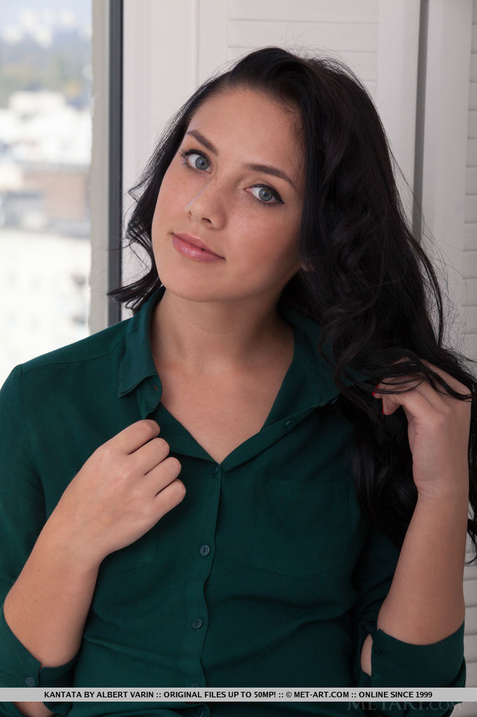 Kantata strips off her long-sleeved shirt and denim jeans to reveal her athletic body and firm assets