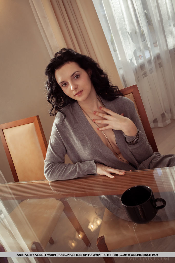 Anatali shows off her beautiful tits and sweet pussy on the chair.