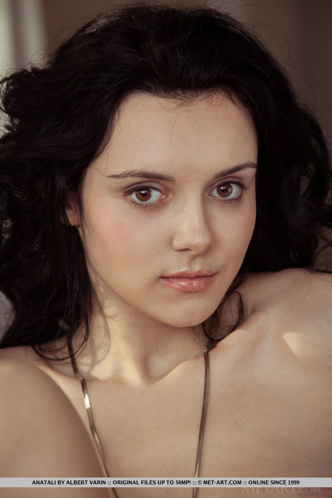 Anatali shows off her beautiful tits and sweet pussy on the chair.