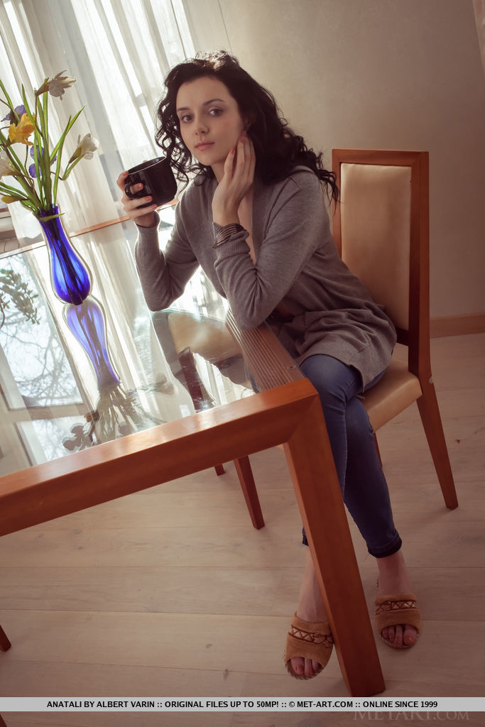 Anatali shows off her beautiful tits and sweet pussy on the chair.