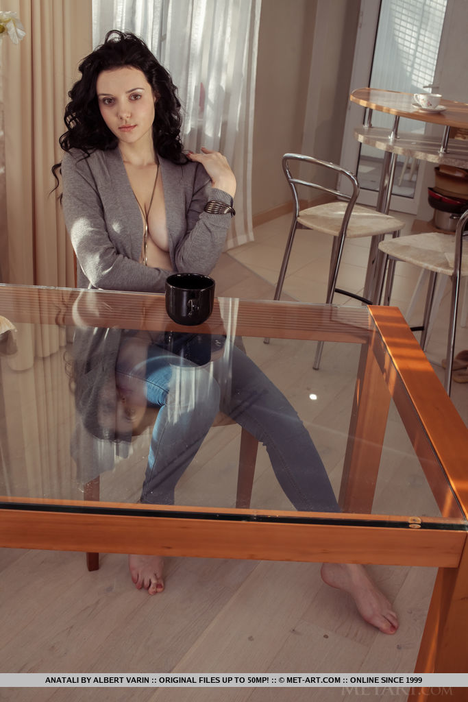 Anatali shows off her beautiful tits and sweet pussy on the chair.