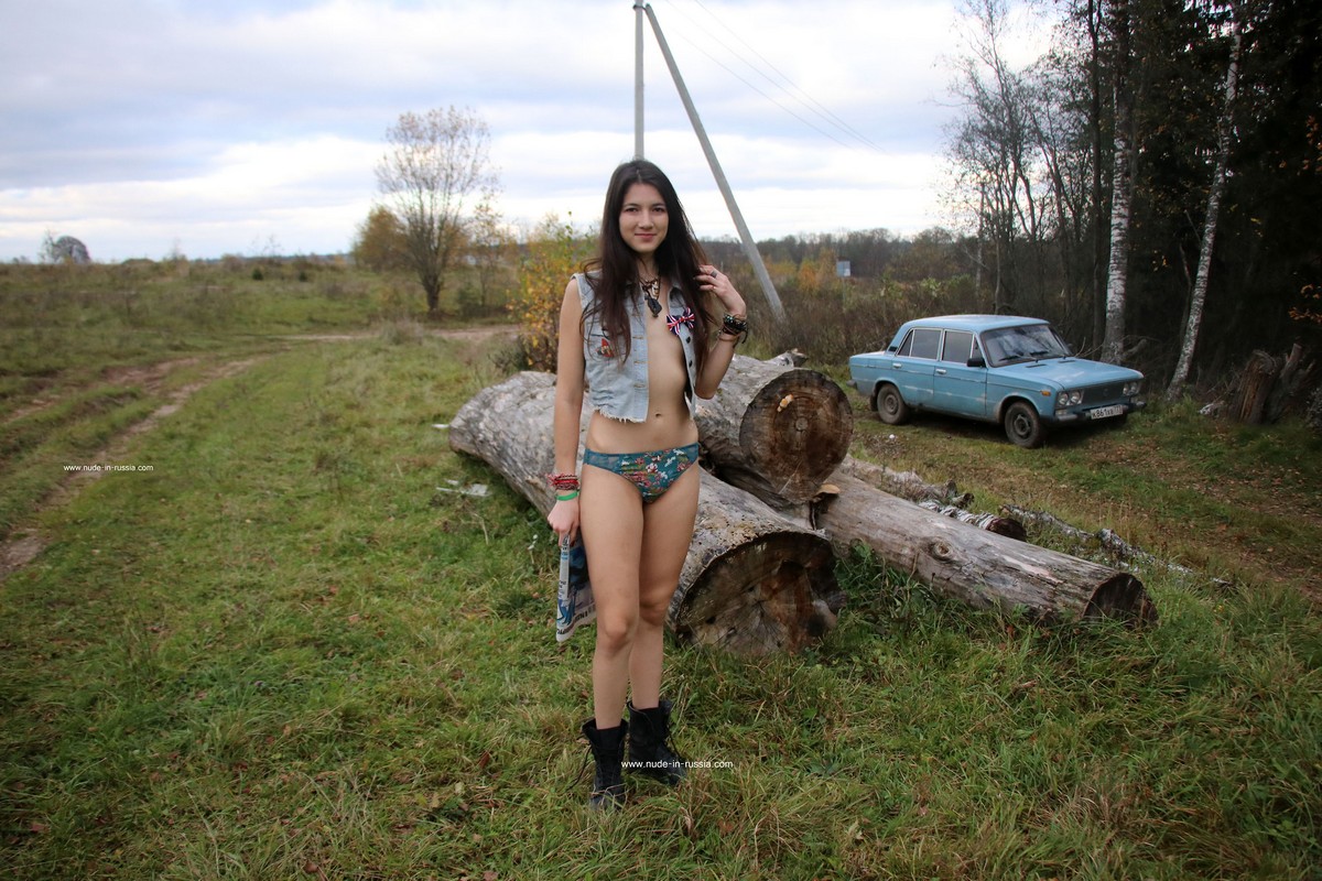 Camille 2 — Reading Newspaper Outdoors