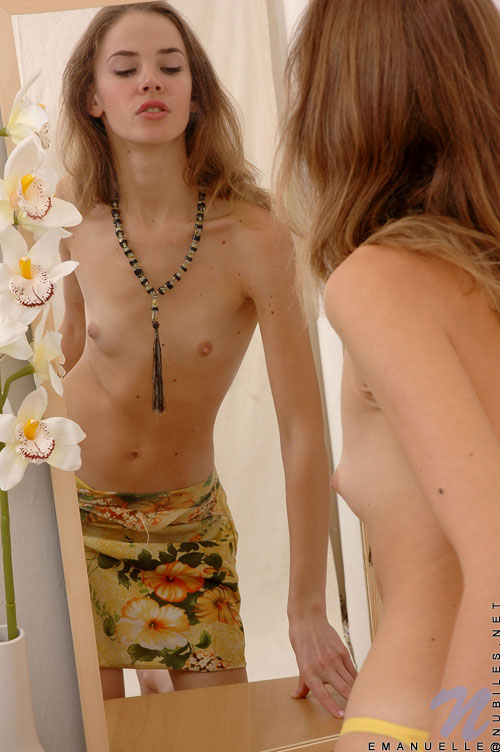 Naughty girl flaunting her trimmed pussy and cute tiny tits