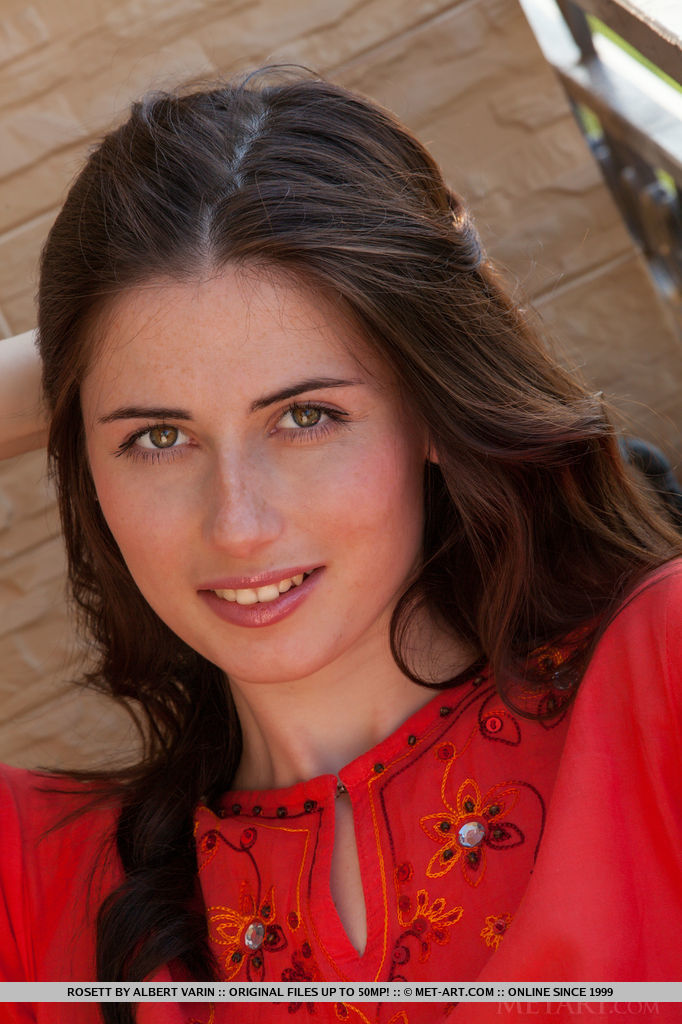 Rosett undresses her red kaftan dress, revealing a pair of small yet exquisitely pink and puffy breast, pink pussy with a cute trimmed bush, and smooth, svelte legs.