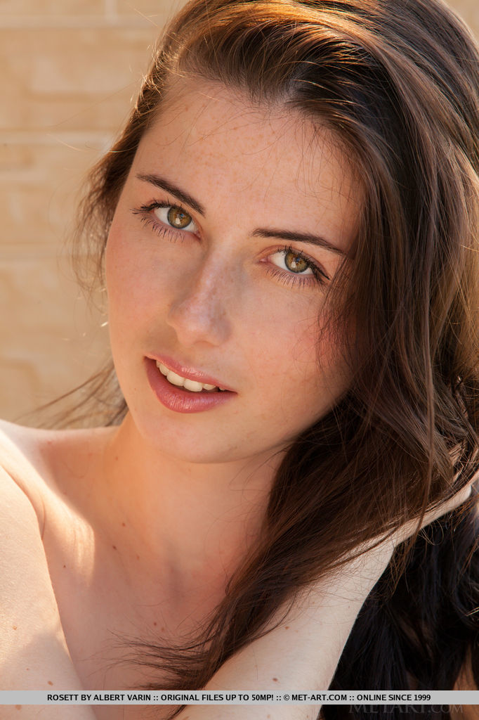 Rosett undresses her red kaftan dress, revealing a pair of small yet exquisitely pink and puffy breast, pink pussy with a cute trimmed bush, and smooth, svelte legs.