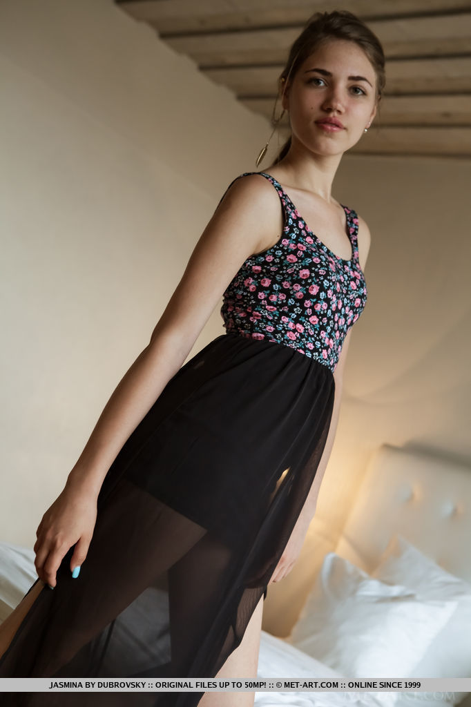 With her youthful allure and innocent looks, Jasmina debuts on top of the bed with her nubile body.