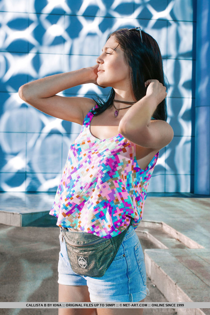 Callista B shows off her smoking hot body as she poses by the beach.