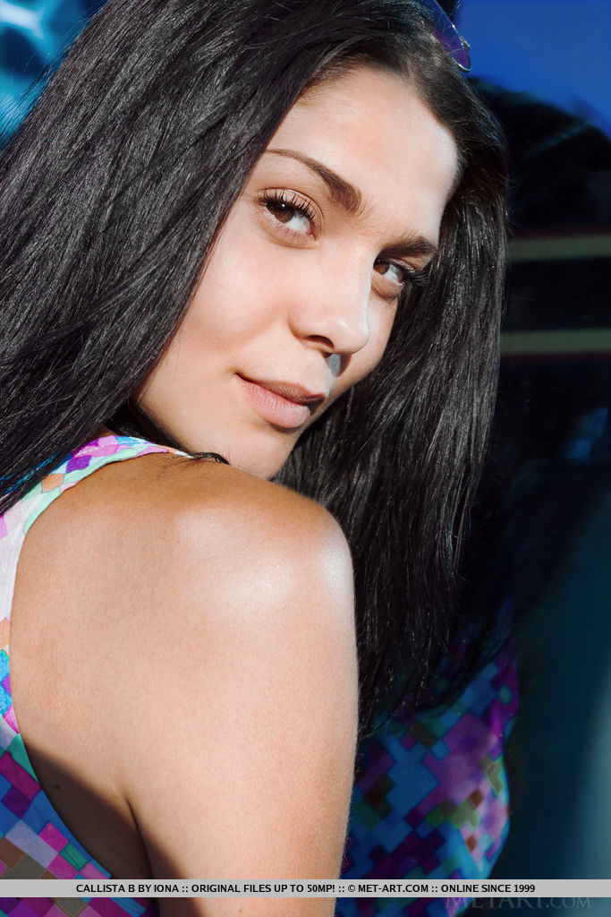 Callista B shows off her smoking hot body as she poses by the beach.