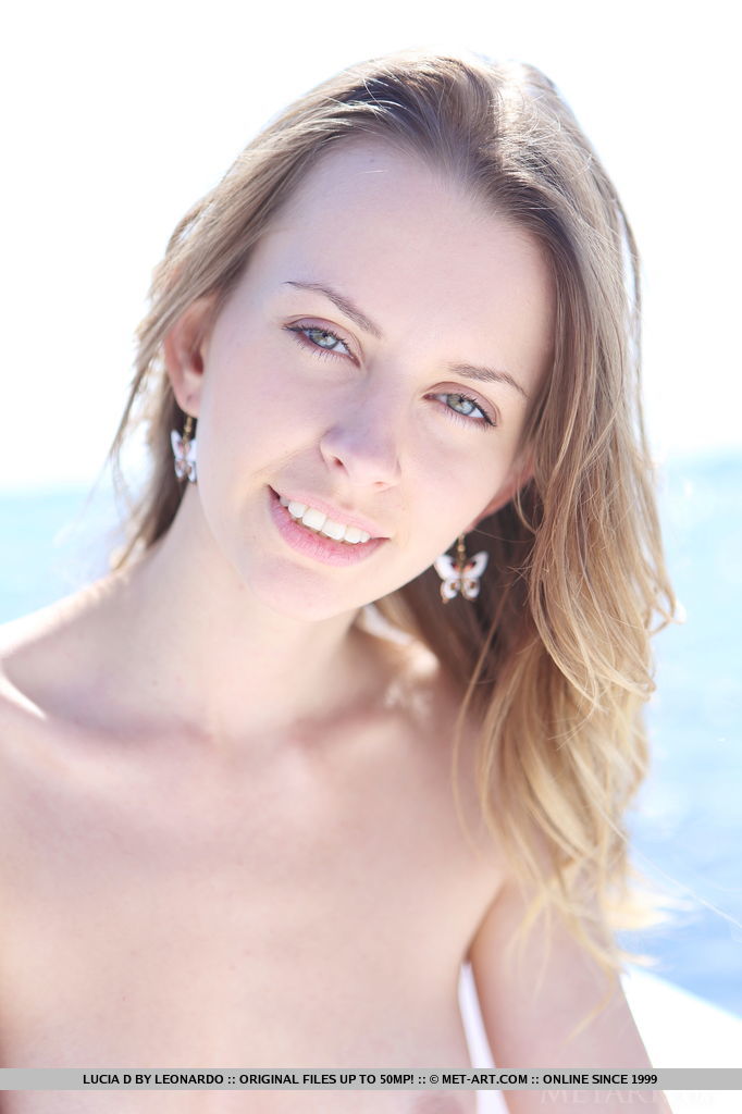 Lucia D sunbathes nude on a boat