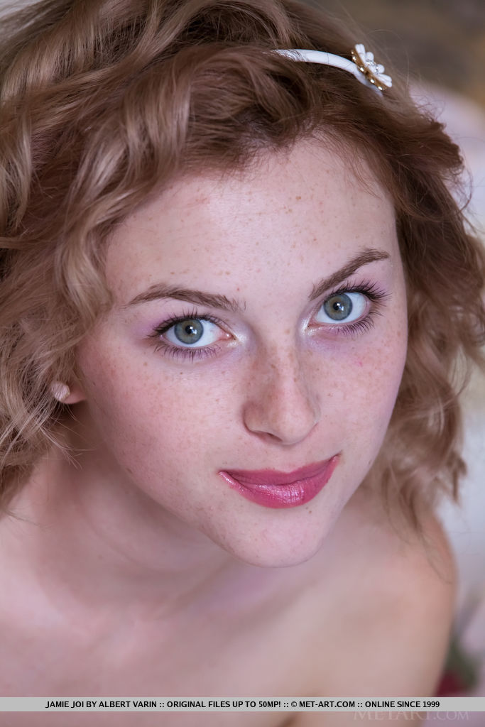 Alluring Jamie Joi shows off her creamy, slender body and sweet pussy on the bed.