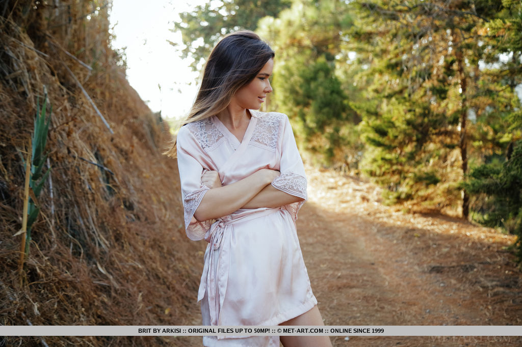 Brit flaunts her tight body as she delightfully poses outdoors.