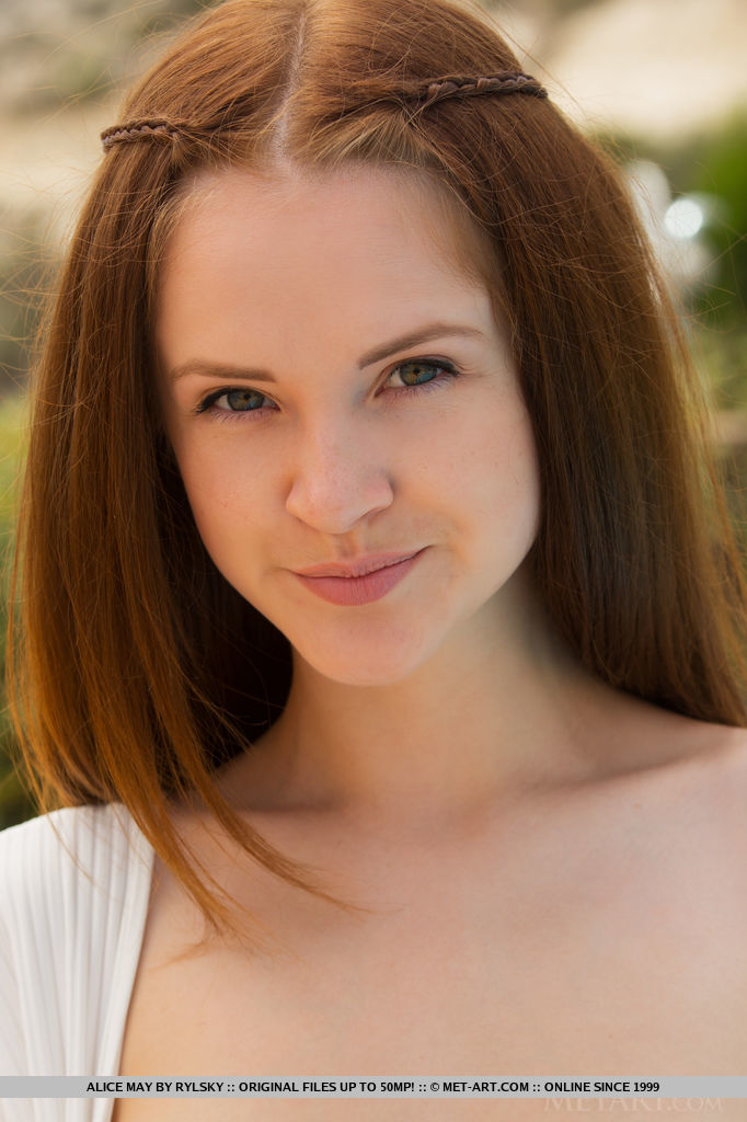 Alice May shows off her petite body and delectable pussy under the sun.