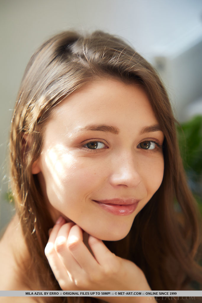 Stunning Mila Azul pops her big heavy breasts out from her off shoulder top and flirtatiously slip out of tight skirt revealing her smooth hairless pussy and amazing slender figure.