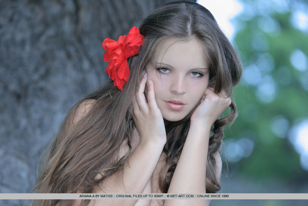 Stunning Ariana A showing off her sexy body under the tree