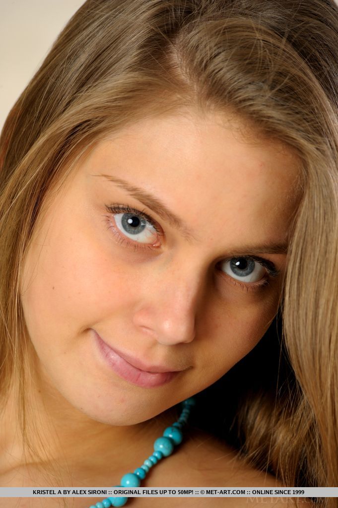 Kristel A demure and sexy in her teal summer dress showing off her long luscious legs