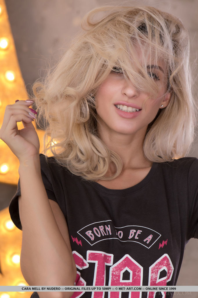 Cara Mell shows off her gorgeous body and trimmed pussy in front of the camera.