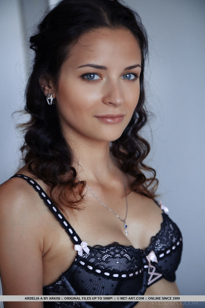 Ardelia A shows off her slender body, puffy tits and delectable pussy on the   couch.