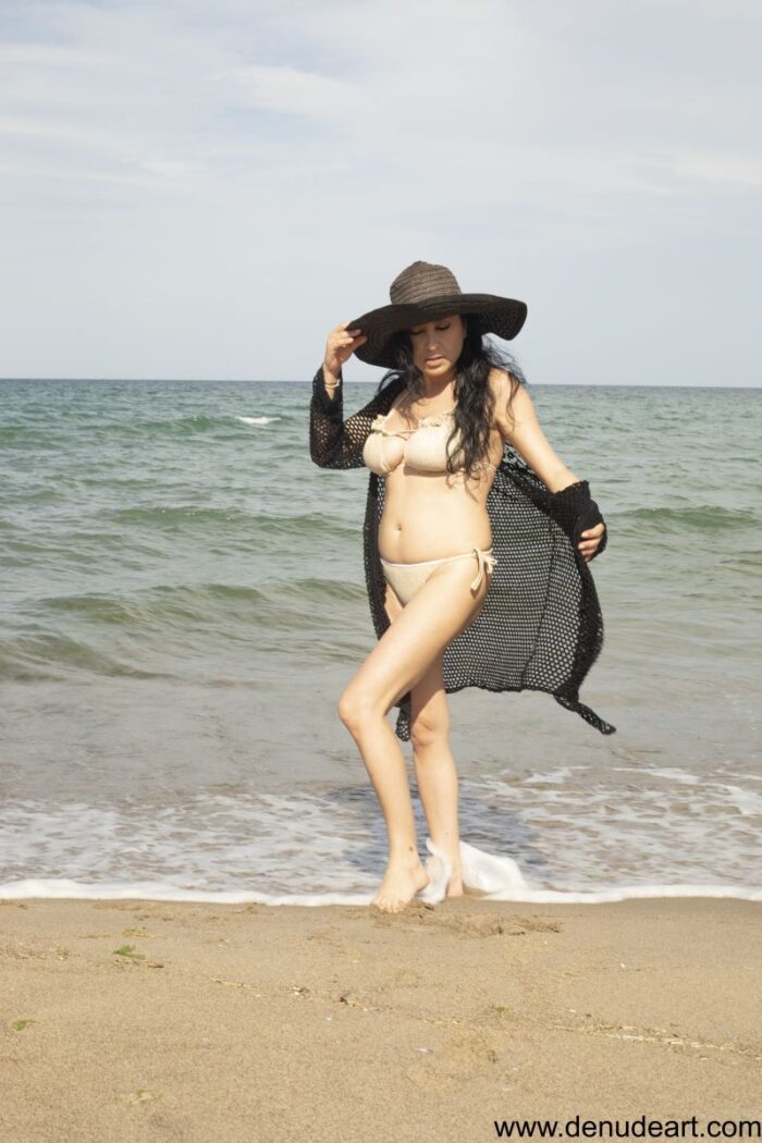 Busty natural young mile nude at the beach