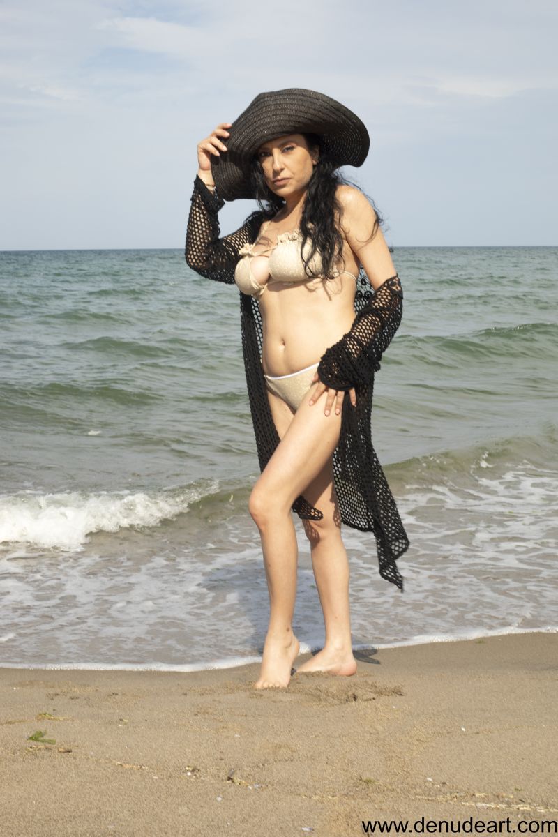 Busty natural young mile nude at the beach