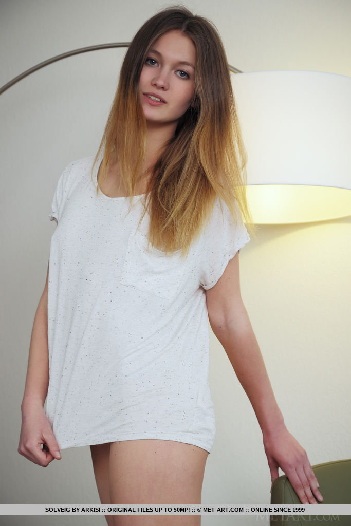 Solveig proves that she doesn't need lavish sets or background to accentuate her erotic self. With her uninhibited personality, she bends and poses naturally, showcasing her athletic, tight body into a variety of explicit poses.