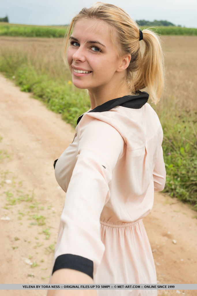 Busty Yelena flaunts her gorgeous tits and meaty pussy outdoors.
